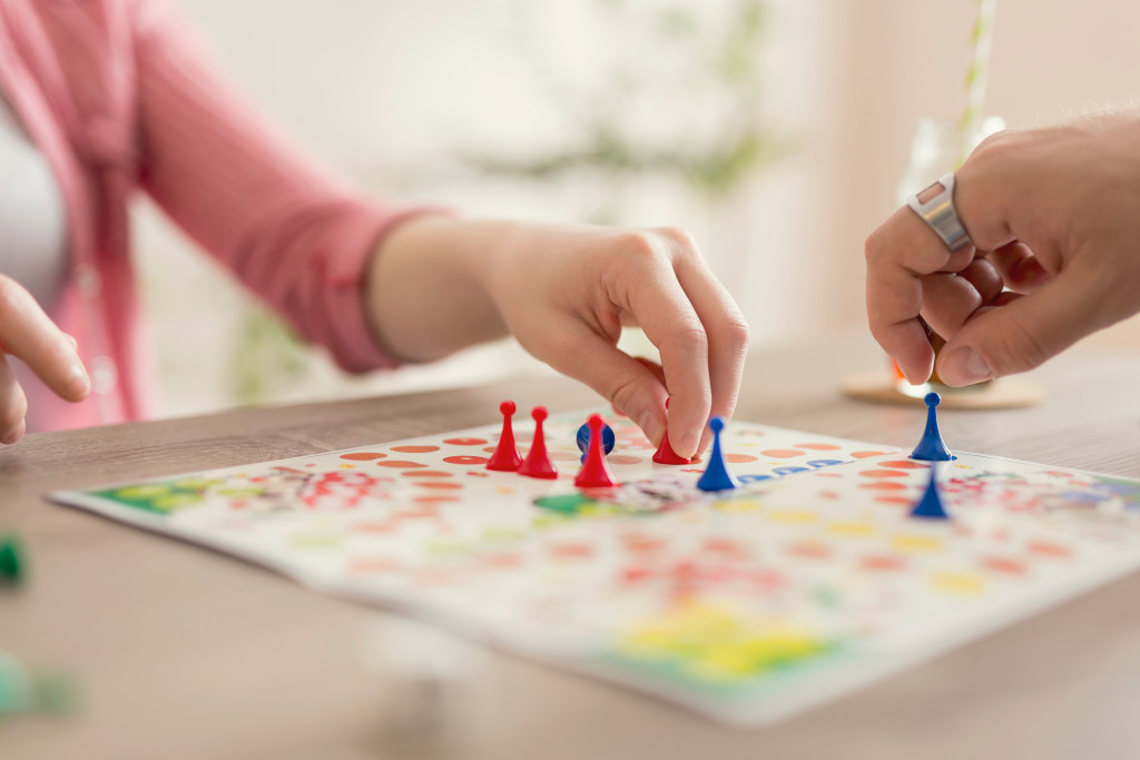 couple playing a board game