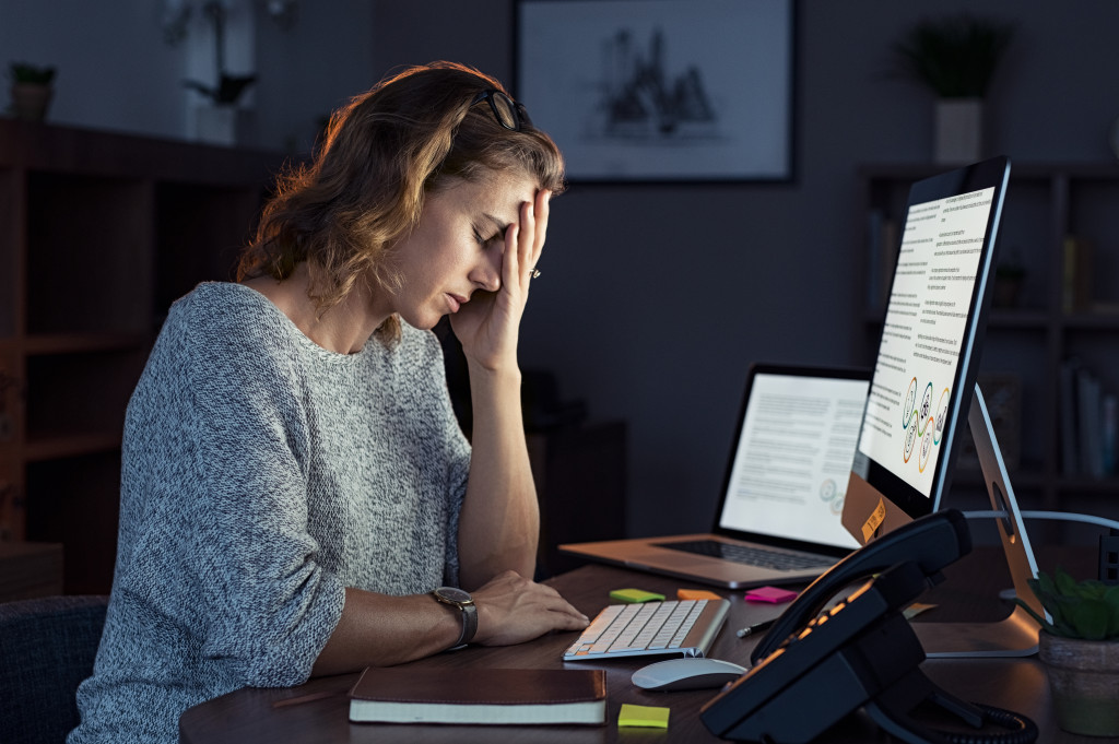 Tired woman at work