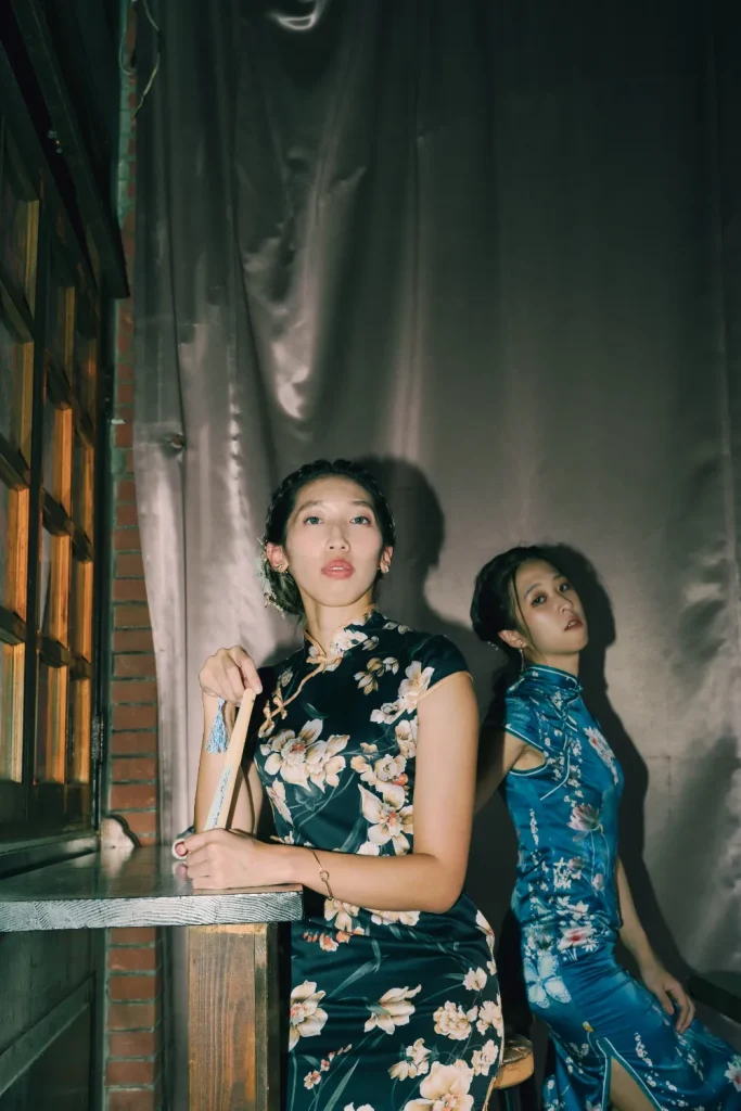 two women posing in traditional chinese clothing